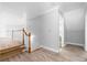 Attic space with laminate flooring, white trim, and neutral paint, plus ample space at 1920 Lee Patrick Dr, Dacula, GA 30019