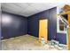 Unfinished basement offers a blank canvas for customization with painted navy blue walls at 1920 Lee Patrick Dr, Dacula, GA 30019