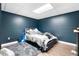 Basement bedroom with trendy blue walls, laminate flooring, and recessed lighting at 1920 Lee Patrick Dr, Dacula, GA 30019