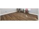 Bedroom featuring laminate flooring, desk, and window, offering a cozy workspace at 1920 Lee Patrick Dr, Dacula, GA 30019