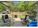 Outdoor deck features metal shade structure, barbecue grill, and patio seating at 1920 Lee Patrick Dr, Dacula, GA 30019