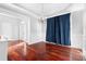 Formal dining room with hardwood floors, elegant chandelier, and wainscoting, perfect for entertaining guests at 1920 Lee Patrick Dr, Dacula, GA 30019