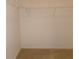 Walk-in closet featuring wire shelving and neutral carpet at 120 Montgomery Dr, Stockbridge, GA 30281