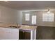 Open kitchen overlooking the dining and Gathering room featuring granite countertops and an island at 120 Montgomery Dr, Stockbridge, GA 30281