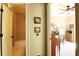 Hallway showing bathroom and bedroom with a ceiling fan at 1520 Camden Cove Dr, Cumming, GA 30040