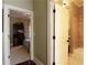 Hallway view of a bedroom and bathroom at 1520 Camden Cove Dr, Cumming, GA 30040