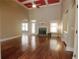 Inviting living room showcasing hardwood floors, a cozy fireplace, and ample natural light at 1520 Camden Cove Dr, Cumming, GA 30040