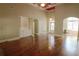 Open concept living area with built-in bookshelves, hardwood floors, and a bright, airy atmosphere at 1520 Camden Cove Dr, Cumming, GA 30040