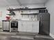 Efficient kitchen with stainless steel appliances and open shelving at 215 Piedmont Ne Ave # 304, Atlanta, GA 30308