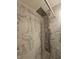 Marble tiled shower with multi head shower panel and fixtures at 215 Piedmont Ne Ave # 304, Atlanta, GA 30308