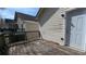 Rustic wooden deck with siding and back door at 7128 Crystal Creek Pl, Douglasville, GA 30134