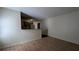Spacious living room view features wood flooring and open access to kitchen at 7128 Crystal Creek Pl, Douglasville, GA 30134