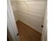 A walk-in closet with custom wire shelving and hardwood floors provides ample storage space at 1735 Derry Sw Ave, Atlanta, GA 30310