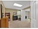 Finished basement area with bookshelves, drawers, and ample space for various activities at 2018 Sugar Maple Ln, Woodstock, GA 30189