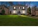 Charming two-story home with a manicured lawn and inviting curb appeal, perfect for Gathering living at 2018 Sugar Maple Ln, Woodstock, GA 30189