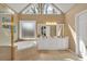 Spacious main bathroom offers a soaking tub, walk-in shower, and double vanity at 2018 Sugar Maple Ln, Woodstock, GA 30189