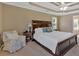 Spacious main bedroom with trey ceilings features a ceiling fan and bedside tables at 2018 Sugar Maple Ln, Woodstock, GA 30189