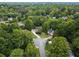 A beautiful home nestled in a lush, green neighborhood with mature trees at 3851 Westwick Nw Way, Kennesaw, GA 30152