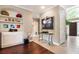 Open-concept foyer featuring tile flooring, high ceilings, and a seamless transition to the living spaces at 3851 Westwick Nw Way, Kennesaw, GA 30152