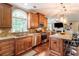 Stylish kitchen with custom cabinets, granite countertops, stainless steel appliances, and a breakfast bar at 3851 Westwick Nw Way, Kennesaw, GA 30152