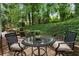 Private backyard patio with seating, perfect for relaxation and enjoying the outdoors at 3851 Westwick Nw Way, Kennesaw, GA 30152
