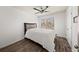 Bedroom with ceiling fan and hardwood floors at 372 Mulberry Se Row, Atlanta, GA 30354