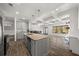 Modern kitchen with granite countertops, stainless steel appliances, and hardwood floors at 372 Mulberry Se Row, Atlanta, GA 30354