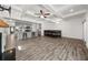 Bright open-concept living space featuring coffered ceilings and wood-look flooring at 372 Mulberry Se Row, Atlanta, GA 30354