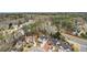 This aerial view showcases a community with varied home styles, mature landscaping, and organized street layouts at 4554 Alaspair Ln, Acworth, GA 30101