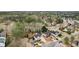 A neighborhood with a mix of house styles, mature trees and a meandering road at 4554 Alaspair Ln, Acworth, GA 30101