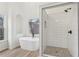 Bright bathroom showcasing a freestanding tub, shower, and a window view at 4554 Alaspair Ln, Acworth, GA 30101