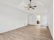 Light and bright bedroom with wood-look floors and an ensuite bath at 4554 Alaspair Ln, Acworth, GA 30101