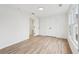 Bedroom featuring hardwood floors, closet, and bright natural light at 4554 Alaspair Ln, Acworth, GA 30101