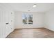 Bedroom with hardwood floors, a window and a closet at 4554 Alaspair Ln, Acworth, GA 30101