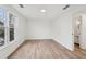 Bright bedroom with hardwood floors and a window view at 4554 Alaspair Ln, Acworth, GA 30101