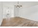 Large open-concept living room with hardwood floors, vaulted ceilings, and ample natural light at 4554 Alaspair Ln, Acworth, GA 30101