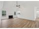 Light-filled living room with hardwood floors, vaulted ceilings and a cozy fireplace at 4554 Alaspair Ln, Acworth, GA 30101