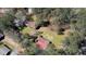 An aerial view of a house and a large barn on a lush, grass-covered property at 5190 Paul Sw Cir, Conyers, GA 30094
