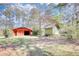 The property includes a barn and a shed in a grassy, wooded area at 5190 Paul Sw Cir, Conyers, GA 30094