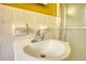 Bright bathroom vanity with white tile and modern chrome faucet at 5190 Paul Sw Cir, Conyers, GA 30094