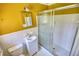 Bathroom featuring a shower, a single sink vanity, and yellow walls at 5190 Paul Sw Cir, Conyers, GA 30094