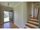Entryway featuring hardwood floors and staircase access at 5190 Paul Sw Cir, Conyers, GA 30094