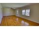 Bright living room featuring hardwood floors and natural light at 5190 Paul Sw Cir, Conyers, GA 30094