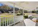 Inviting front porch featuring a swing and ample space to enjoy the peaceful neighborhood views at 928 Gate Post Ln, Lawrenceville, GA 30044