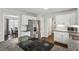 Modern kitchen with granite countertops, stainless steel appliances, and ample cabinet space for storage at 928 Gate Post Ln, Lawrenceville, GA 30044