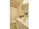 Cozy bathroom features tile floors, single sink vanity, and shower at 732 Jacoby Dr, Loganville, GA 30052