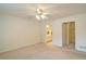 This is a spacious carpeted bedroom with a connecting bathroom and closet at 732 Jacoby Dr, Loganville, GA 30052