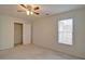Bright bedroom features large window and closet space at 732 Jacoby Dr, Loganville, GA 30052