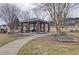 Open brick pavilion with picnic tables, seating, and landscaped surroundings at 732 Jacoby Dr, Loganville, GA 30052
