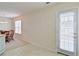 Bright dining area features a chandelier and a window with natural light at 732 Jacoby Dr, Loganville, GA 30052